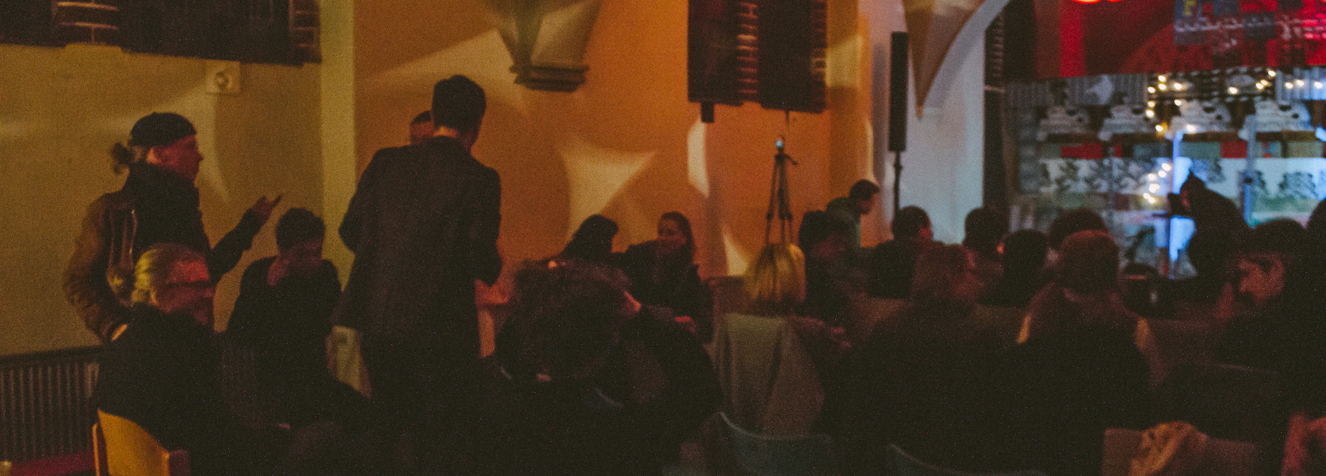 An audience getting ready for a concert.