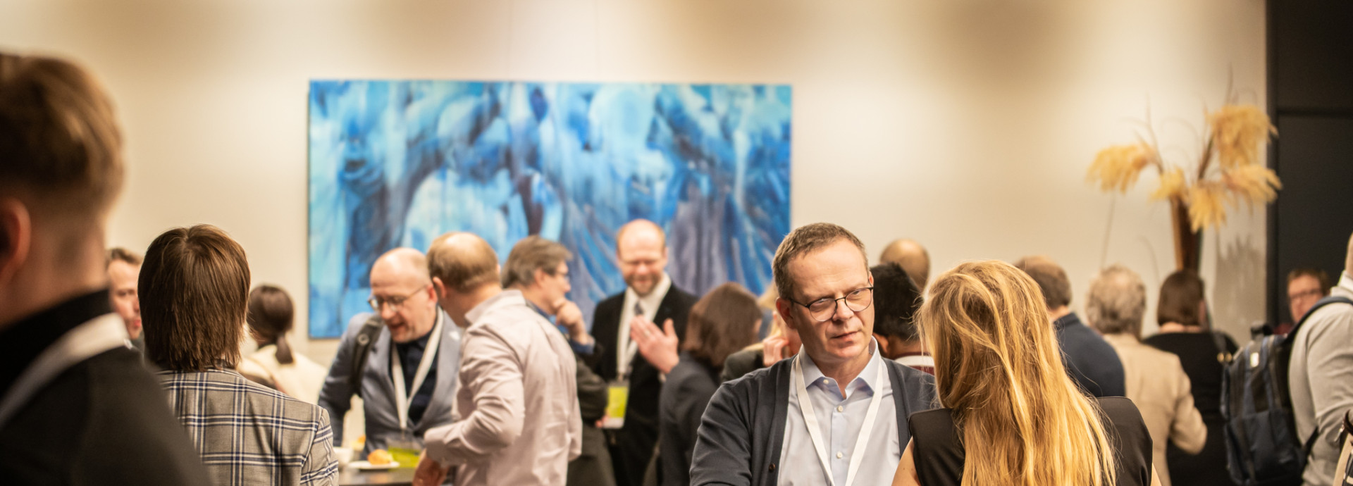 Participants engaging in networking, exchanging ideas, and building connections during the event