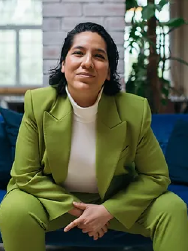 Diana Alatriste González smiling at a camera. 