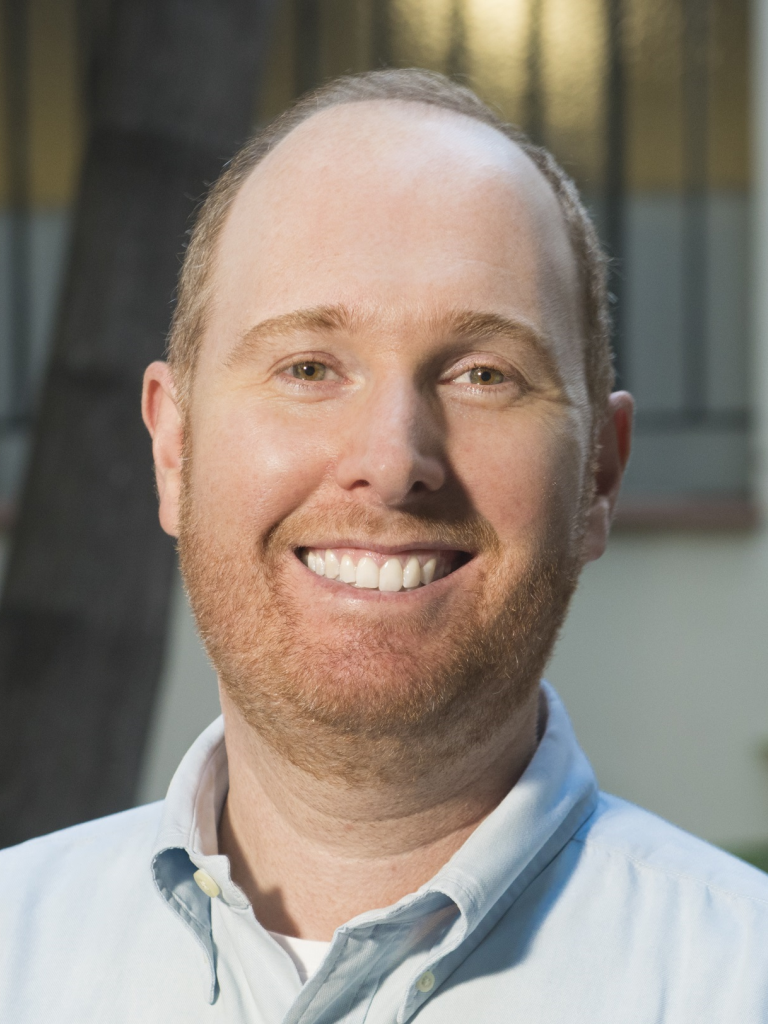 Dr. Eduardo Eizirik poses looking at the camera. 